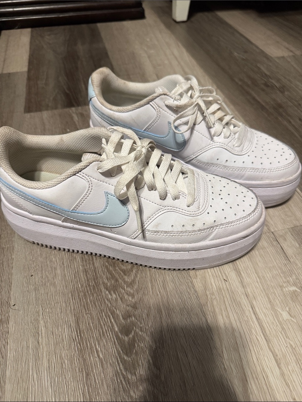 Nike Women's Air Force shoe with a platform